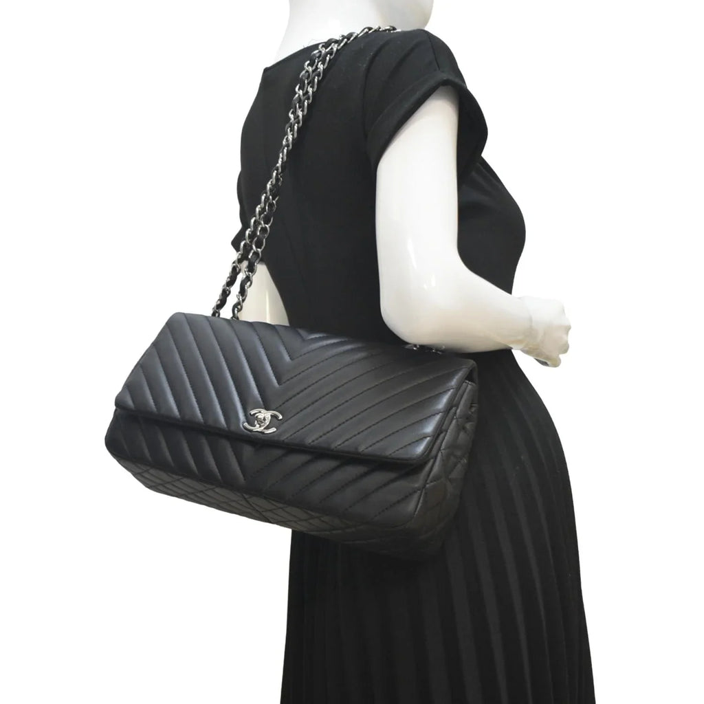 Pre-Owned CHANEL Surpique Chevron Medium Lambskin Leather Flap Crossbody Bag Midnight