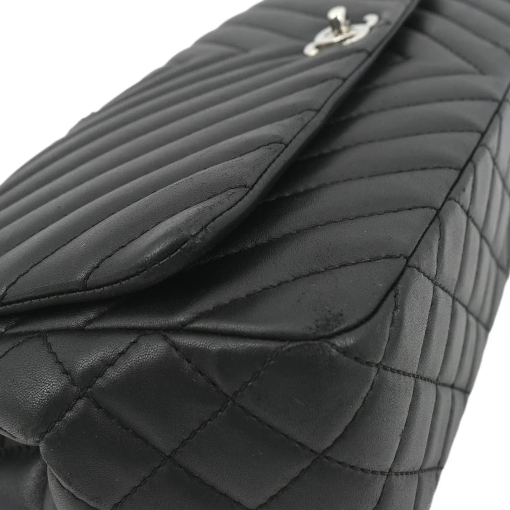 Pre-Owned CHANEL Surpique Chevron Medium Lambskin Leather Flap Crossbody Bag Midnight