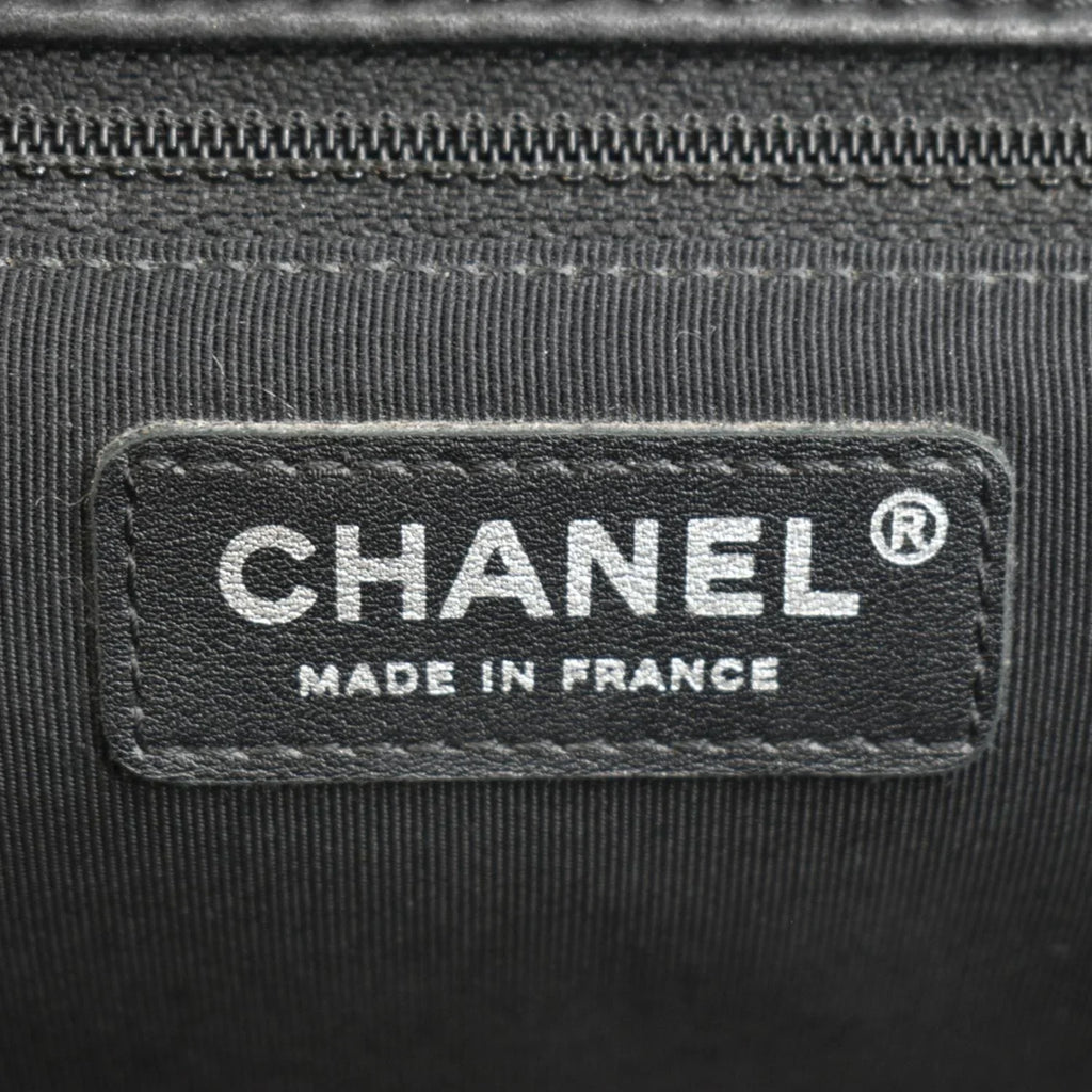 Pre-Owned CHANEL Surpique Chevron Medium Lambskin Leather Flap Crossbody Bag Midnight