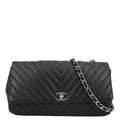 Pre-Owned CHANEL Surpique Chevron Medium Lambskin Leather Flap Crossbody Bag Midnight