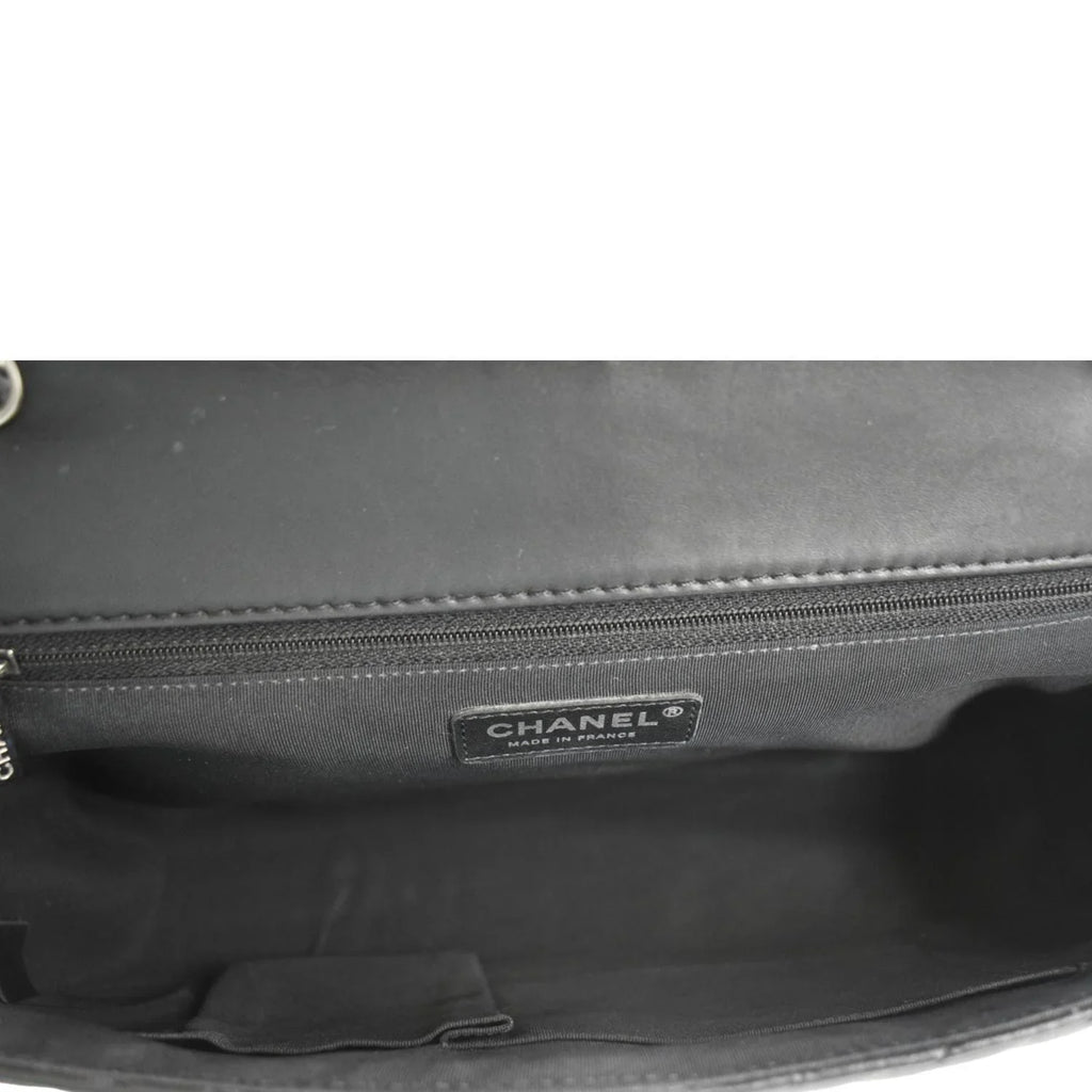 Pre-Owned CHANEL Surpique Chevron Medium Lambskin Leather Flap Crossbody Bag Midnight